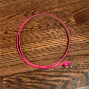 Stylish pink skinny belt